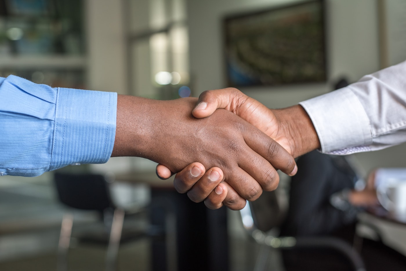 LFA Consulting advisor shaking hands with a client